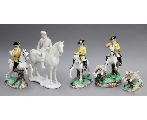 A Group of Four Nymphenburg Porcelain Hunting Figures, coloured in enamels and raised on naturalistic bases, comprising: a Hu