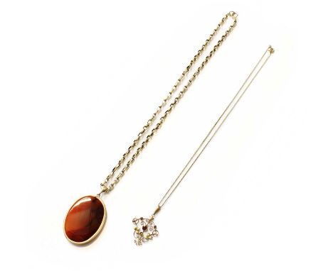 An Agate Pendant on Chain, the oval agate in a rubbed over setting on a trace link chain, pendant length 6.2cm, chain length 