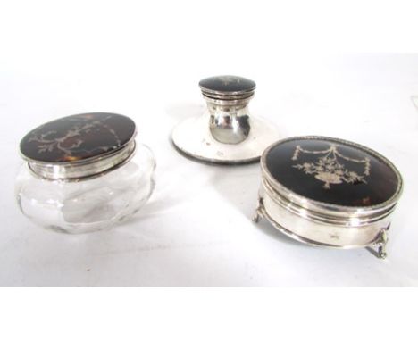 A silver pique and tortoiseshell mounted capstan inkwell, a similar ring box and a dressing table box and cover, various date