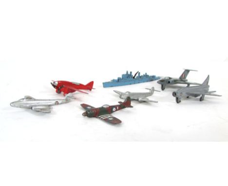 Six Dinky aircraft including P1B Lighting, Meteor, Gloster Javelin, and three others, together with a Tri-ang model of HMS Su