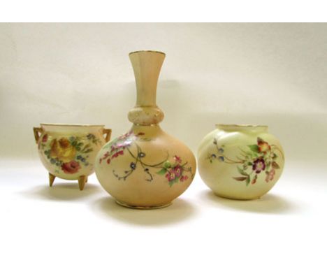 Three pieces of Royal Worcester blush ivory, various dates, to include a bottle vase, cauldron and a spherical vase, each dec