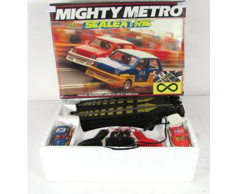 A Scalextric 'Mighty Metro' set (boxed) CONDITION REPORT: Appears complete but not been set out to confirm, no warranty is of