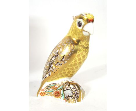 Citron Cockatoo a Royal Crown Derby paperweight, gilt button, boxed CONDITION REPORT: Good