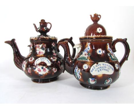 A Bargeware teapot inscribed 'Mr and Mrs Mallender, Orchard Street, Newhall' beneath pheasants, the cover with teapot finial;