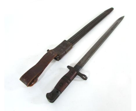 An American bayonet stamped 1913 11-16 leather scabbard stamped BH & G 1940, blade l. 43 cm CONDITION REPORT: Some wear to th