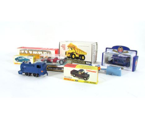 A collection of mainly Dinky die cast vehicles to include Ferrari 312 Model 226, Centaur dump trunk Model 924, Ford Capri Mod