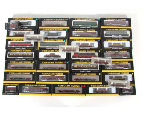 A collection of Graham Farish N-gauge rolling stock, to include coaches, trucks and wagons. all boxed (parcel). CONDITION REP