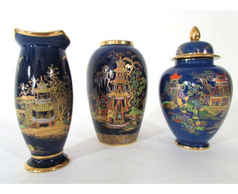 Three pieces of Carltonware, each with gilt and enamel decoration of a chinoiserie scene on a powder blue ground, h. 18 cm an