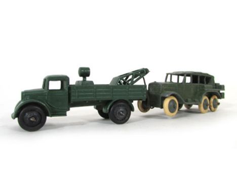 A Dinky reconnaissance car, model 152B, with white tyres, together with a Dinky army breakdown lorry with search light and cr