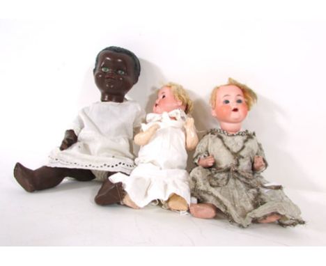 An Armand Marseille bisque headed doll, model 990 with blonde wig, blue glass eyes, open mouth showing two teeth. h. 37 cm; t