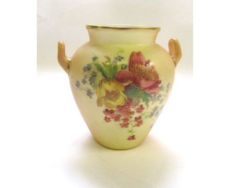 A Royal Worcester blush ivory two handled vase, 1900, decorated with scrolling flowers; together with a similarly decorated c