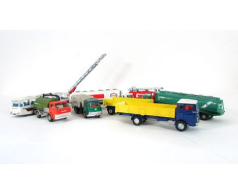 A collection of Dinky die cast lorries and coaches to include Vega major luxury coach 952, AEC tanker marked for ESSO, anothe