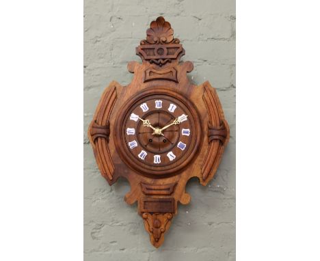 A C19th French Black Forest walnut 15 day lozenge shaped wall clock with painted enamel markers and vincentini movement.