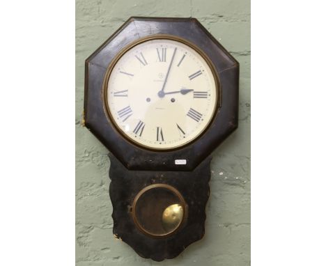 A Junghans eight day drop dial wall clock with painted face and Roman numeral markers