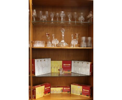 A good collection of lead crystal drinking glasses some still in original boxes, along with a cut glass decanter and a model 