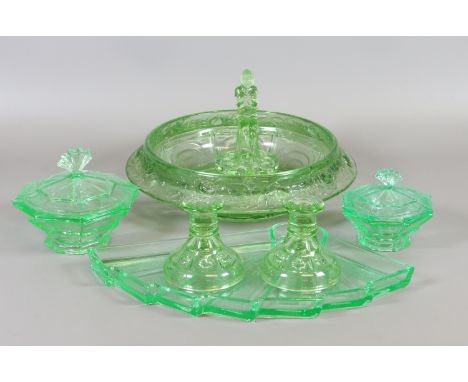 A collection of Art Deco uranium green glass to include part dressing table trinket dishes and table centrepieces etc.