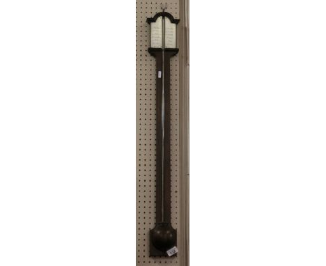 An early C19th inlaid mahogany stick barometer with silvered dial.