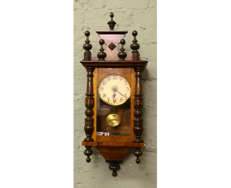 A mahogany miniature Vienna spring driven eight day wall clock.