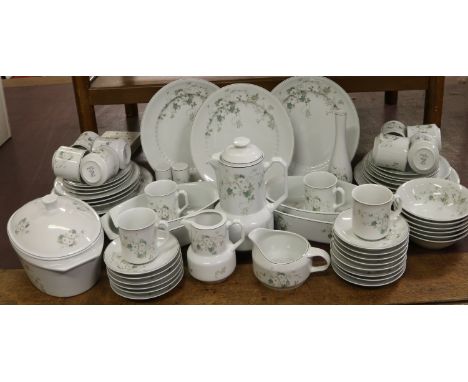A Porcelana Brasil part dinner service comprising dinner plates, side plates, cups, saucers, tureens etc.