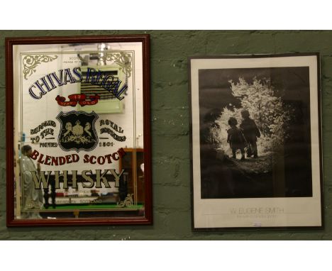 An early C20th chivas Regal advertising mirror, along with a W. Eugene Smith print 'the walk of paradise garden'.
