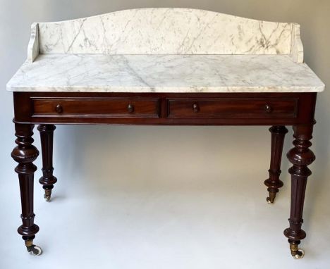 WASHSTAND, 19th century circa 1880 mahogany with two frieze drawers, reeded supports with gilt metal/ceramic castors and gall