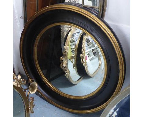 WALL MIRROR, Regency style, ebonised frame, 80cm diam. (with faults) 