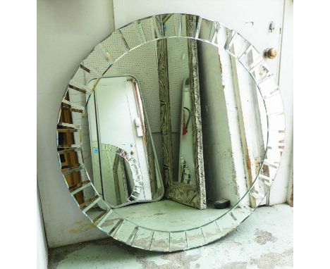 WALL MIRROR, 111cm diam., contemporary design, segmented mirrored frame. 