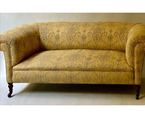 VICTORIAN CHESTERFIELD SOFA, smoke blue on yellow brocade with urn bouquets and trellis with rounded back and arms, 182cm W. 