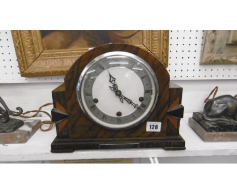 AN OAK CASED MANTLE CLOCK