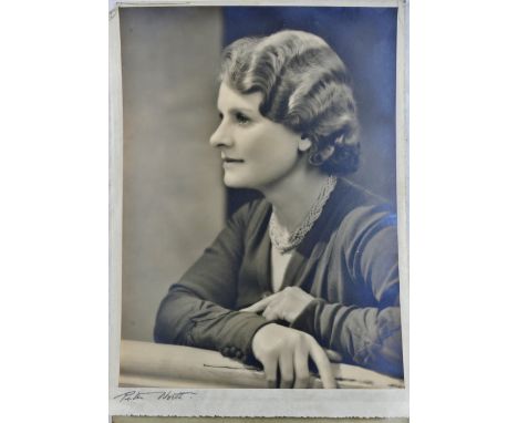 Two 1940's portrait photographs by Dorothy Wilding (1893-1976) and Peter North (act. 1930s - 1950s), possibly of the actress 