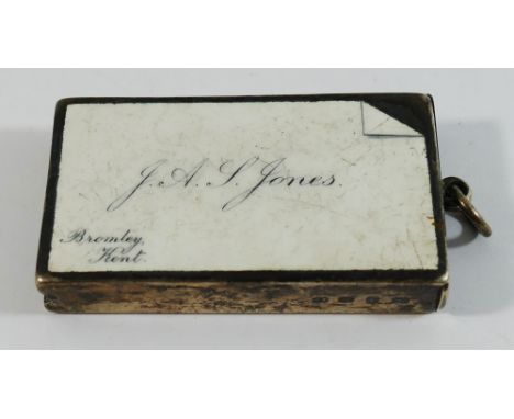 A Victorian novelty rectangular silver and enamel vesta case, Birmingham 1891 by James Fenton, decorated in the manner of a c