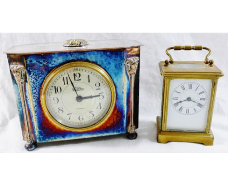 A brass five class carriage clock, the white enamel dial with Roman numerals, and a French mantle clock in silver plated case