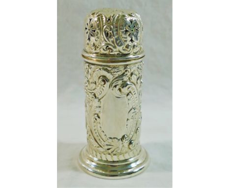 A late Victorian silver sander/pounce pot, decorated all over with embossed scroll and foliate design, Birmingham 1896 by Tho