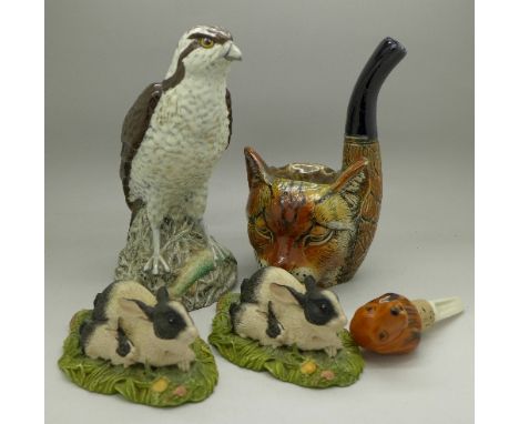 A Beswick Osprey liquor decanter, two Beswick Studio Sculptures rabbit figures, a bottle stopper and a novelty cat ashtray