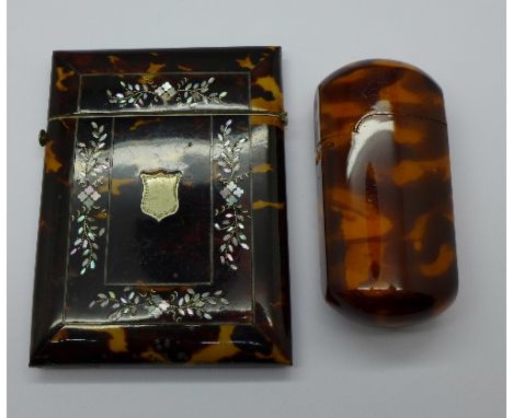 A tortoiseshell card case, inlaid with mother of pearl, restored, and one other case