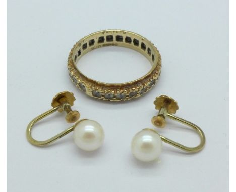 A pair of 9ct gold and pearl earrings and a 9ct gold ring, total weight 4.2g, Q