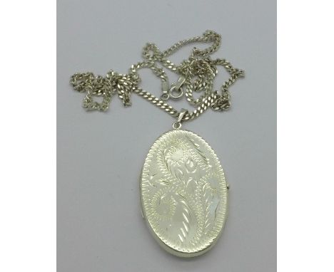 A silver locket and chain