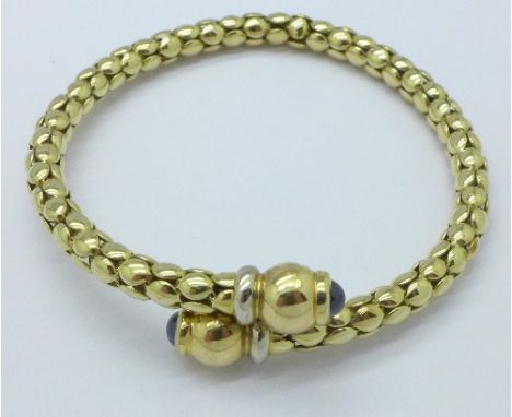 A 9ct gold bangle, 13.8g