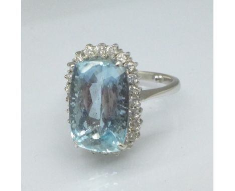 A white metal, diamond and topaz ring, 7.6g, K, blue stone 14mm x 9mm