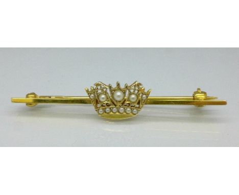 A 9ct gold bar brooch mounted with seed pearl set coronet, Birmingham 1952, 2.9g