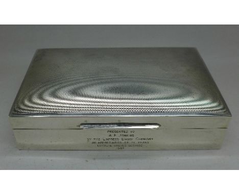 A silver cigarette box by Walker & Hall, with inscription dated 1957, total weight 411g, 14cm