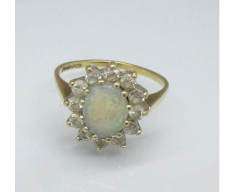 A 9ct gold, opal and cubic zirconia ring, 2.1g, L