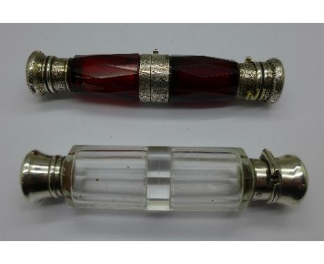Two double ended scent bottles:- folding ruby glass marked Mawson & Thompson and clear glass marked S. Mordan & Co., London, 