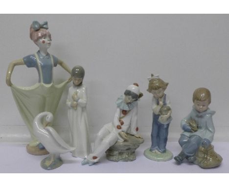 A Lladro goose and five Nao figures