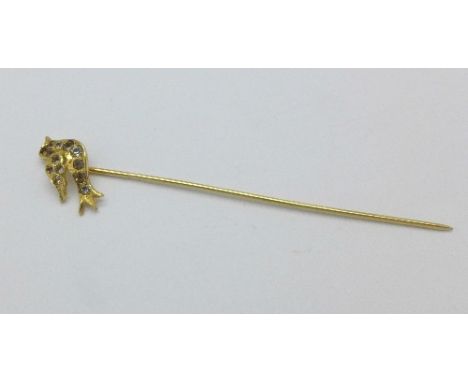 A 14ct gold, rhinestone, ruby and sapphire stick pin