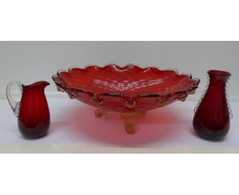 A ruby glass footed bowl/centrepiece, 36cm and two items of cranberry glass