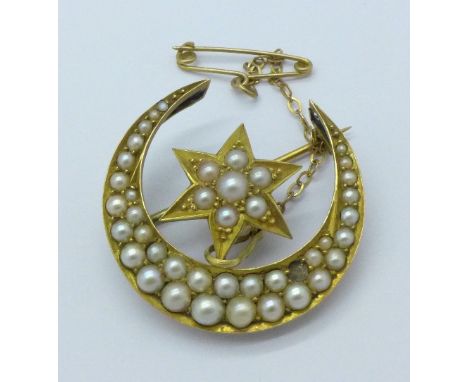 A yellow metal seed pearl set crescent brooch, 5.7g, 28mm