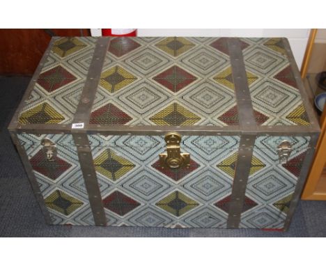 A large vintage metal and wood travelling trunk, 102 x 58 x 59cm.
