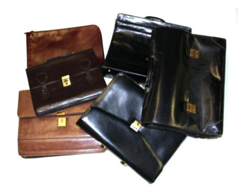 A group of gent's vintage leather briefcases.