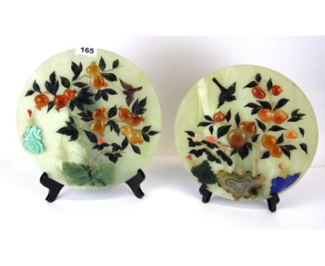 A superb pair of Chinese jade discs inlaid with semi-precious stones, Dia. 26.5cm.